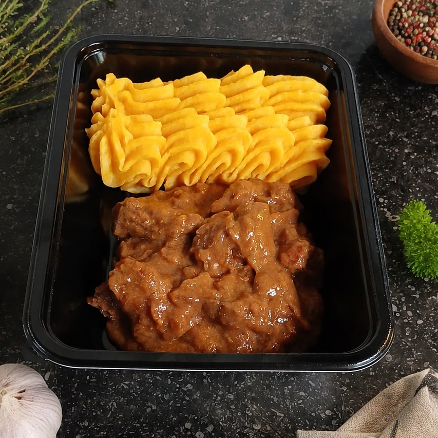 Varkensstoofvlees met wortelpuree